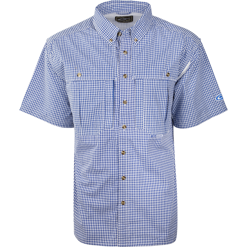 A blue Gingham Plaid Wingshooter's Shirt S/S: Blue & white checkered shirt for hunting & outdoor activities. Cotton/poly blend, quick-drying, breathable, with multiple pockets & heat vents. From Drake Waterfowl.