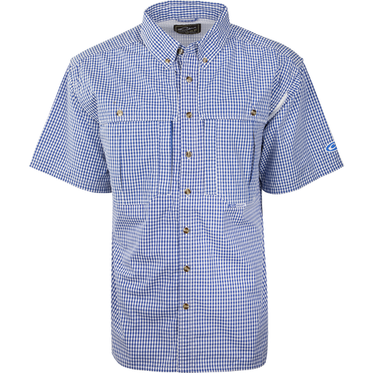 A blue Gingham Plaid Wingshooter's Shirt S/S: Blue & white checkered shirt for hunting & outdoor activities. Cotton/poly blend, quick-drying, breathable, with multiple pockets & heat vents. From Drake Waterfowl.