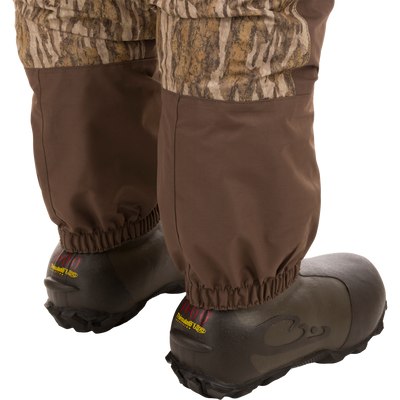 Women’s Insulated Guardian Elite Vanguard Breathable Waders featuring HD2 material, reinforced seams, internal handwarmer pockets, and 1600g Thinsulate Buckshot Mud boots for superior warmth and comfort.