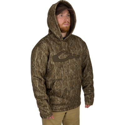Man wearing the LST Silencer Fleece-Lined Hoodie, featuring a double-lined hood and kangaroo pouch, designed for comfort and durability in outdoor conditions.