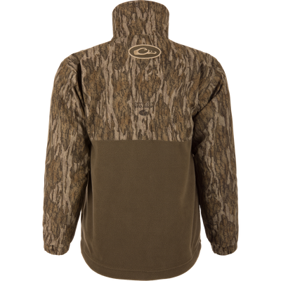 Back view of MST Youth Eqwader Full Zip Jacket, featuring Mossy Oak Bottomland camo on the upper half and olive-brown fleece below, designed for waterfowl hunting comfort.