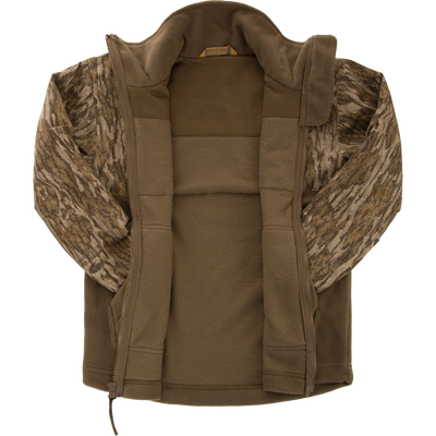 MST Youth Eqwader Full Zip Jacket with olive fleece body, camo sleeves, and patented waterproof technology, featuring a full-length zipper and small collar label.