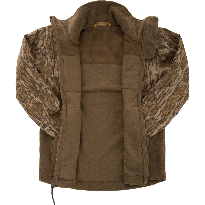 MST Youth Eqwader Full Zip Jacket with olive fleece body, camo sleeves, and patented waterproof technology, featuring a full-length zipper and small collar label.