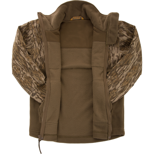 MST Youth Eqwader Full Zip Jacket with olive fleece body, camo sleeves, and patented waterproof technology, featuring a full-length zipper and small collar label.