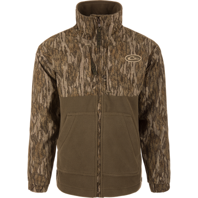 MST Youth Eqwader Full Zip Jacket featuring tree-bark camo print and olive-green fleece, stand-up collar, hand-warmer pockets, and dual-zone waterproof and breathable fabric.