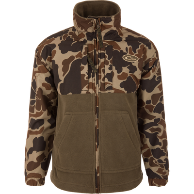 MST Youth Eqwader Full Zip Jacket featuring camo-shell upper and olive-brown fleece lower, with waterproof sleeves, high collar, and branded zipper pulls for enhanced comfort.