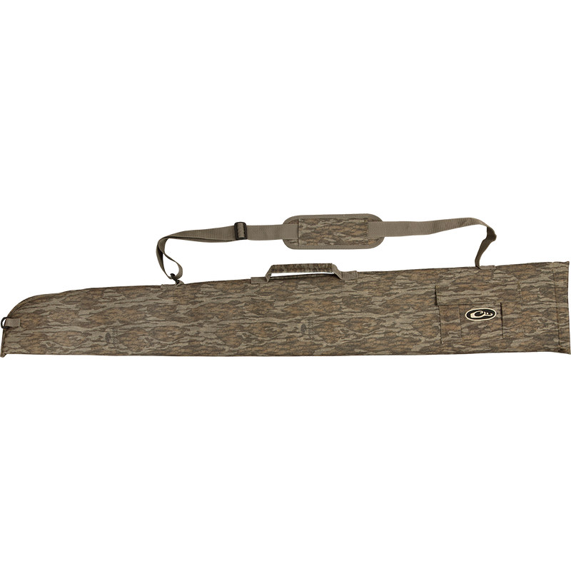 A side-opening gun case with a brown bag and strap, featuring a camouflage pocket and an outer accessory pocket for choke tubes.