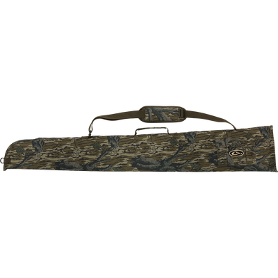 A side-opening gun case with a camouflage design, adjustable strap, and outer accessory pocket for choke tubes.