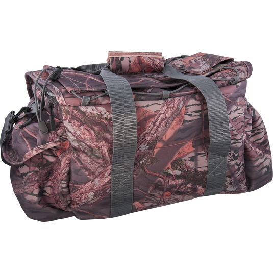 A large floating blind bag with 18 pockets and waterproof compartments for organizing gear. Perfect for hunting and fishing.