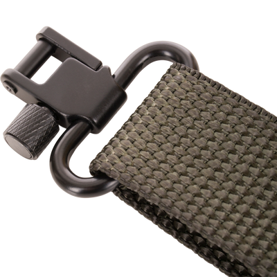 Close-up of the Gunslinger Waterfowl Shotgun Sling's black metal buckle on an olive-green nylon strap, highlighting its durable, quick-release mechanism for secure firearm attachment.