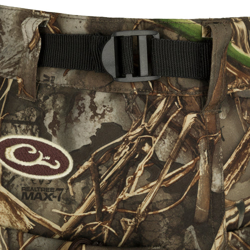 A close-up of the MST Women’s Refuge Bonded Fleece Pants - Realtree, showcasing its waterproof/windproof/breathable outer material and fleece lining.