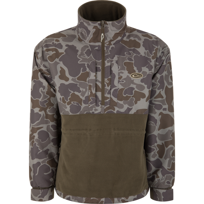 BFCM - MST Camo Eqwader 1/4 Zip Jacket with camouflage pattern, stand-up collar, olive-green fleece panel, and dual-zone waterproof and breathable technology for enhanced comfort in hunting conditions.
