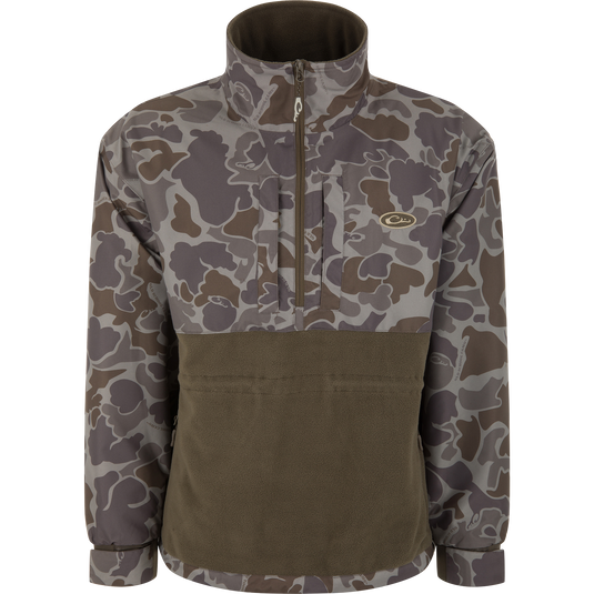 BFCM - MST Camo Eqwader 1/4 Zip Jacket with camouflage pattern, stand-up collar, olive-green fleece panel, and dual-zone waterproof and breathable technology for enhanced comfort in hunting conditions.