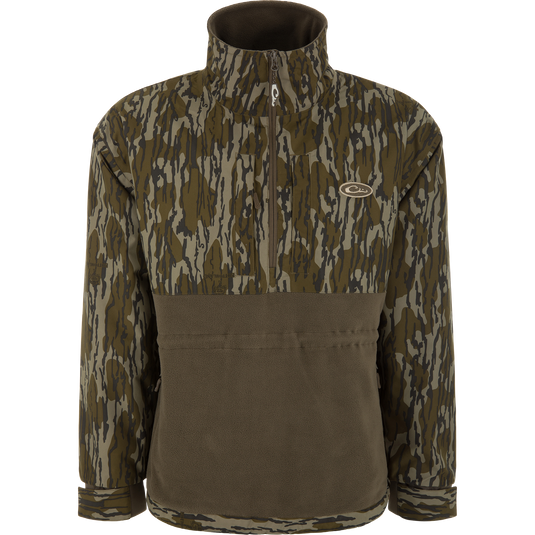 BFCM - MST Camo Eqwader 1/4 Zip Jacket displayed on mannequin, featuring a camo upper and olive-brown fleece lower, perfect for waterfowl hunting.