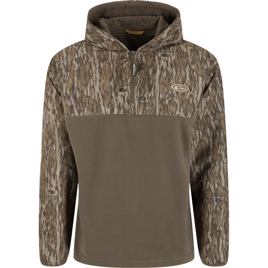 Waterproof and windproof MST Quarter Zip Refuge Eqwader Jacket with Hood featuring a camouflage pattern on the upper section and a solid olive-green fleece lower section.