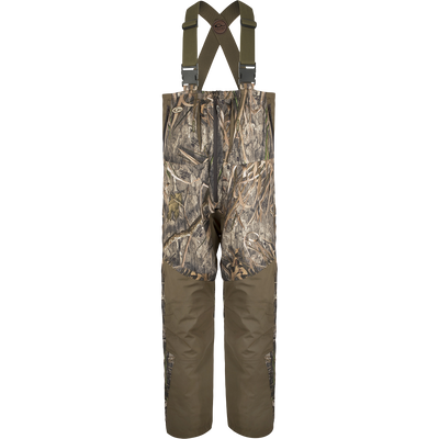 Guardian Flex™ G3 Flex™ Bib with BMZ System Liner: Camouflage overalls with adjustable suspenders and removable insulation panels for customizable warmth.
