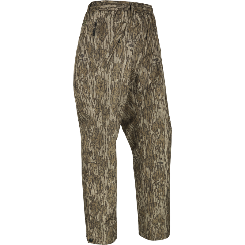 A pair of lightweight, waterproof/windproof/breathable camouflage pants with zippered legs and slash pockets. Ideal for all-day comfort and protection from the elements.
