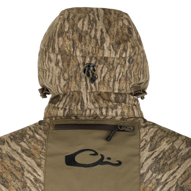 G3 Flex 3-in-1 Waterfowler's Jacket: Close-up of jacket with zipper, buckle, and camouflage hood for ultimate versatility in hunting.