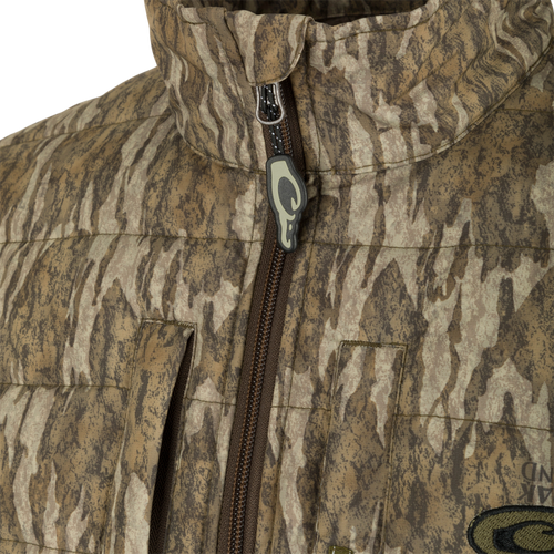 G3 Flex 3-in-1 Waterfowler's Jacket: Close-up of jacket with zipper, logo, and fabric surface. Ultimate versatility for hunters.