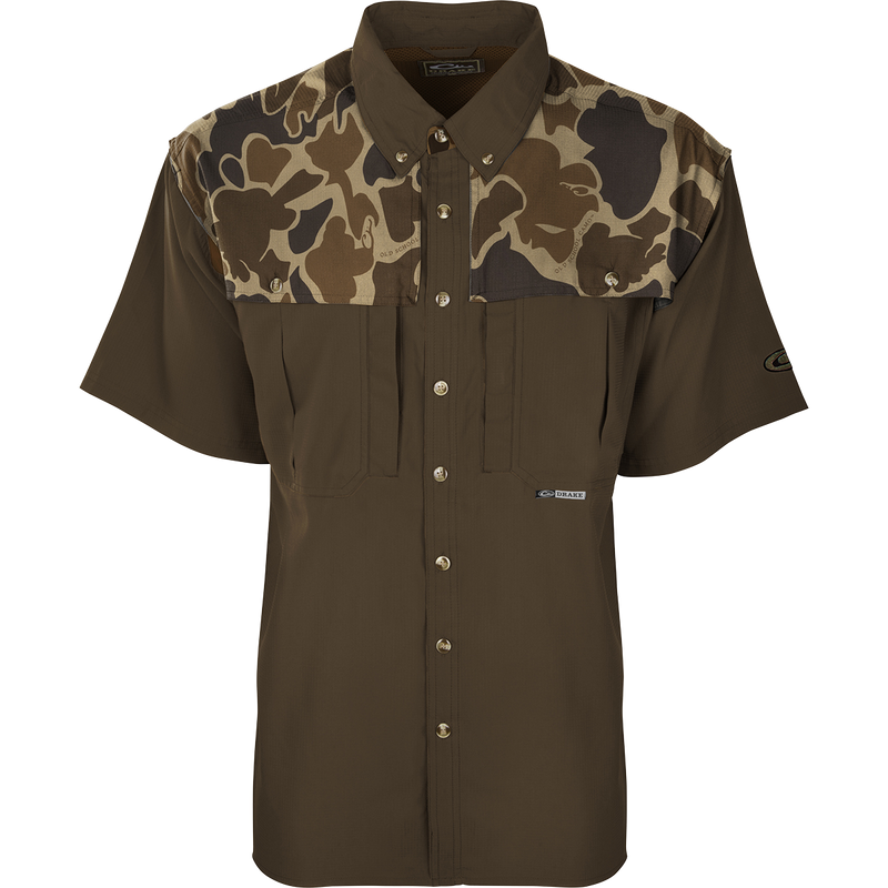 A lightweight, breathable hunting shirt with camouflage design, moisture-wicking fabric, and UPF 50+ sun protection. Features include back vents, mesh panels, Magnattach™ chest pocket, and quick-drying material. Perfect for early season hunting.
