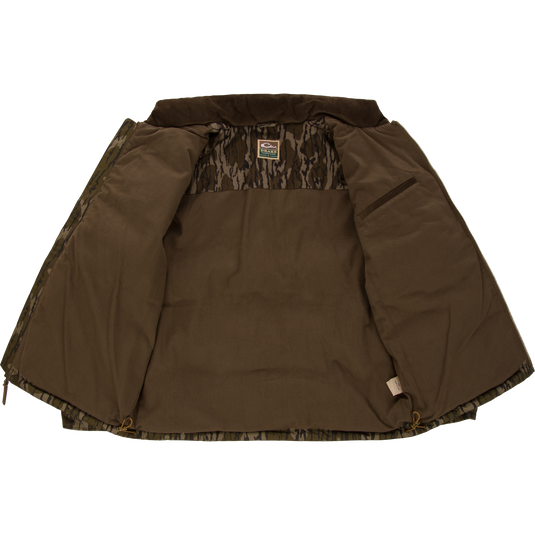 An open, insulated LST Insulated Waxed Cotton Jacket featuring a featherless down fill, a camouflage pattern, and a brown fleece interior lining.