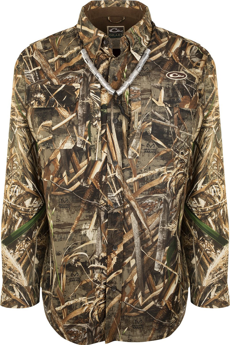 A waterproof Guardian Flex Shirket™ with a camouflage pattern, button-down design, and plenty of pocket storage for hunting essentials.