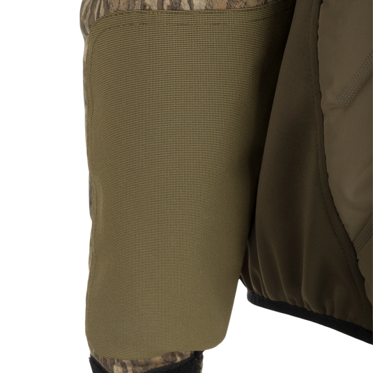 Close-up of Women's LST Guardian Flex Double Down Eqwader 1/4 Zip Jacket, featuring waterproof upper body, insulation, and elbow protection.