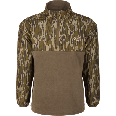 MST Quarter Zip Refuge Eqwader Jacket on a mannequin, featuring a camouflage upper, solid fleece lower, stand-up collar, and small chest logo, ideal for waterfowl hunting.