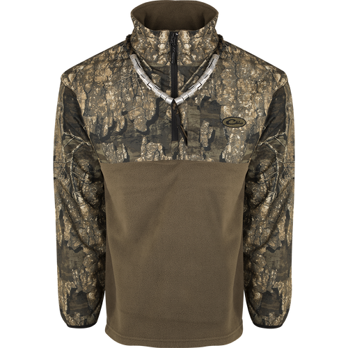 A camouflage jacket with innovative features and advanced fabrics, providing waterproof protection and breathability. MST 1/4 Zip Refuge Eqwader Pullover - Realtree.