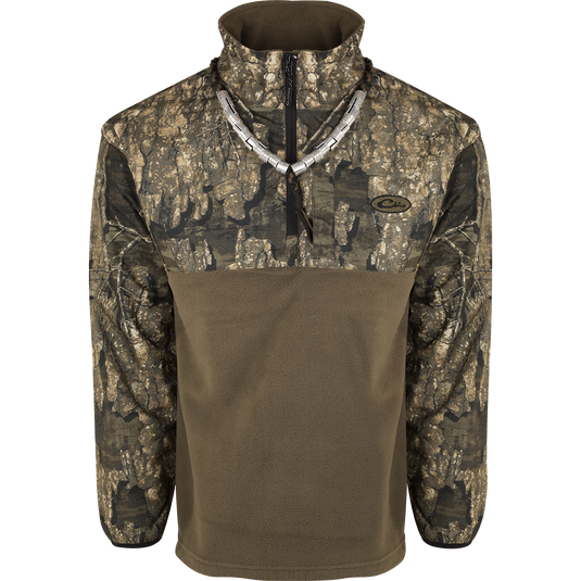 A camouflage jacket with innovative features and advanced fabrics, providing waterproof protection and breathability. MST 1/4 Zip Refuge Eqwader Pullover - Realtree.