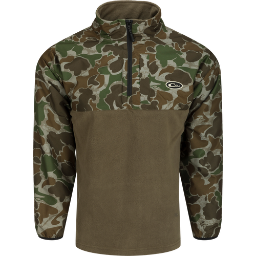 A camouflage MST 1/4 Zip Refuge Eqwader Pullover by Drake Waterfowl, featuring waterproof Refuge HS™ fabric with HyperShield™ 2.0 tech for comfort and performance in waterfowl hunting.