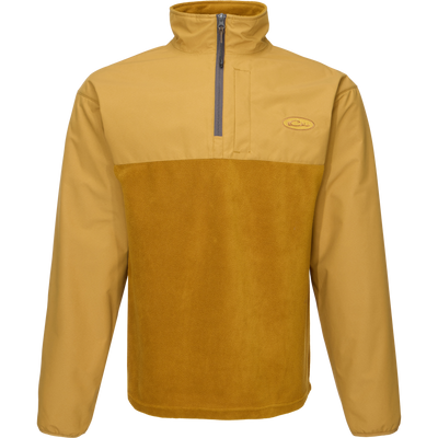 MST Quarter Zip Refuge Eqwader Jacket featuring a close-up of its innovative zipper, logo detail, and durable fabric, designed for superior comfort in waterfowl hunting.