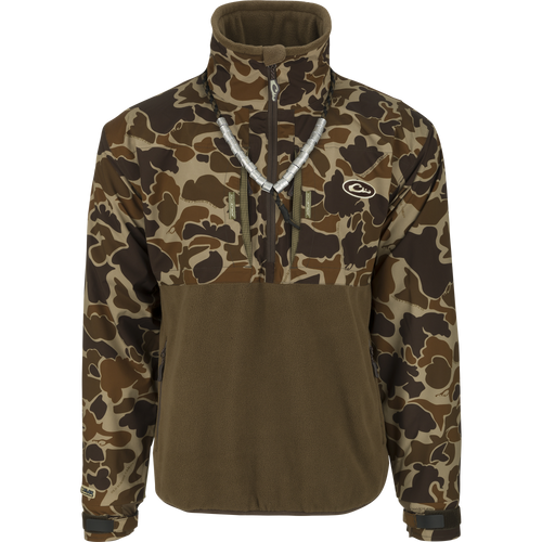 MST Guardian Eqwader Flex Fleece 1/4 Zip Jacket: A camouflage jacket with a necklace, perfect for outdoor style. Waterproof and windproof upper body and arms with breathable fleece lower body. Elbow and forearm protection. Magnattach call and whistle pockets, zippered chest and lower pockets.