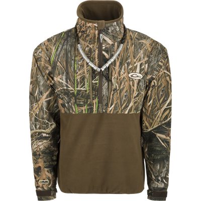 MST Guardian Flex Fleece Eqwader Quarter Zip Jacket showcasing camouflage pattern, long sleeves, zippered pockets, and reinforced elbows, ideal for hunting and outdoor activities.