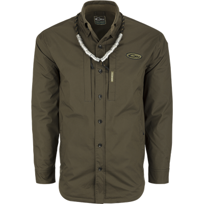 A green shirt with a necklace, ideal for fluctuating weather conditions. Provides comfort like a shirt and waterproofing like a jacket. Plenty of pocket storage for essentials. MST Fleece-Lined Guardian Flex Jac-Shirt.
