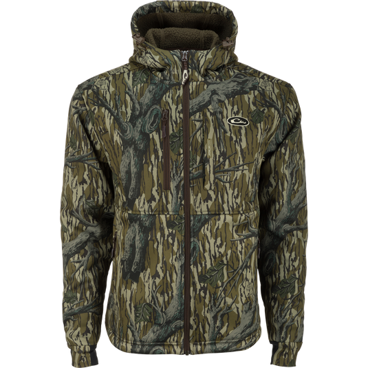 A windproof camouflage jacket with a sherpa-lined lower body for cold weather hunts. Features high handwarmer pockets and adjustable waist/hood.