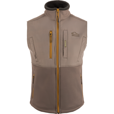 MST Hole Shot Two-Tone Eqwader Vest with windproof upper, sherpa-lined lower, high handwarmer pockets, and adjustable waist, ideal for mid-to-late season hunting.