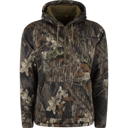 The Waterfowl Slacker Quarter Zip Hoodie features the Mossy Oak Original Break Up camo pattern and is made from durable polyester fleece—perfect for outdoor or hunting use.