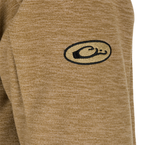 Heathered Windproof 1/4 Zip sweater with logo detail and chest pocket. Stay warm and stylish in any weather with this comfortable fleece jacket.