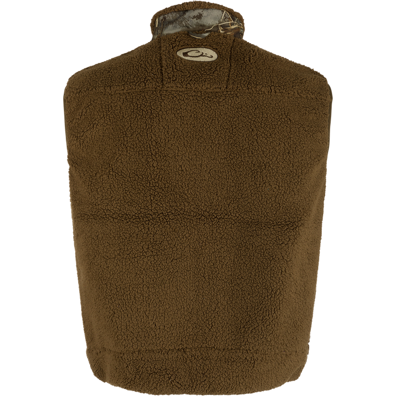 The back of MST Sherpa Fleece Hybrid Liner Vest: A brown fleece vest with excellent heat retention and a windproof membrane for protection. Magnattach™ chest pockets and zippered lower pockets.