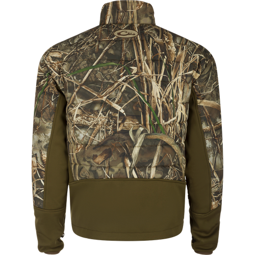 A close-up of a camouflage patterned jacket - LST Double Down Endurance Hybrid Liner - Realtree, offering superior warmth and comfort with synthetic down insulation and elasticated cuffs.