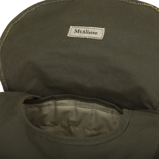 McAlister Wingshot Ditty Bag: A durable khaki bag with brass hardware, waxed cotton, and leather trims. Perfect for hunting trips, it's compact yet spacious enough for essentials. Includes game totes for easy carrying.