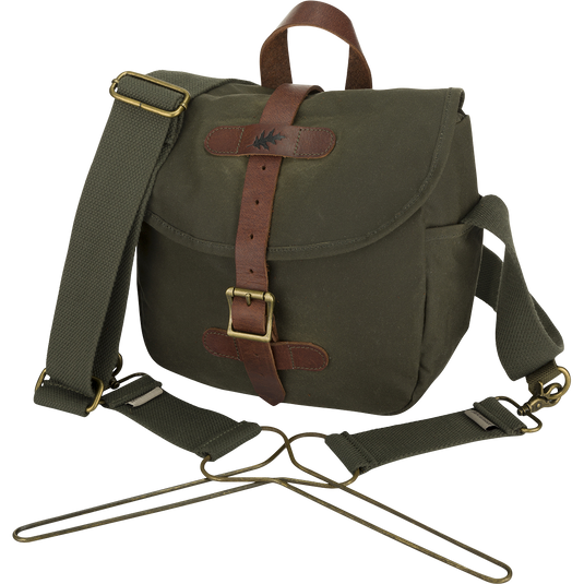 McAlister Wingshot Ditty Bag: A durable hunting bag with waxed cotton, leather trims, and brass hardware. Includes game totes for easy carrying.