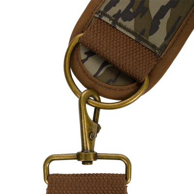 Close-up of the McAlister 3-Way Duck Tote, showcasing its durable fabric strap, metal loops, and detailed craftsmanship in polyester camo and waxed cotton canvas.