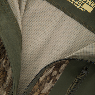 Close-up of the RTL - Half Zip Pullover showcasing its camo pattern, durable stitching, and waffle-textured lining, emphasizing Spider Web Technology for enhanced breathability and durability.