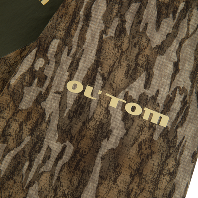 RTL - Half Zip Pullover with Spider Web Technology featuring camouflage pattern and stamped letters, showcasing breathable, durable fabric with ergonomic thumbholes for enhanced turkey hunting gear.