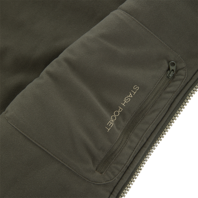 Non-Typical Statix Sherpa Fleece Insulated Vest with zippered stash pocket, visible zipper teeth, and pull, designed for warmth and mobility in hunting conditions.