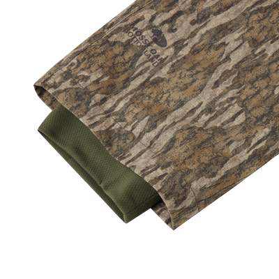 Early Bird Turkey Pant with Insect Repellent featuring camouflage fabric, stretch waistband, and cargo pockets, designed for enhanced mobility and protection during turkey hunting.