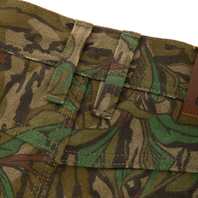 Throwback 80 Field Pant, featuring durable 9.4oz cotton twill, triple stitching, reinforced knees, and antique brass riveted pockets, designed for rugged outdoor activities.
