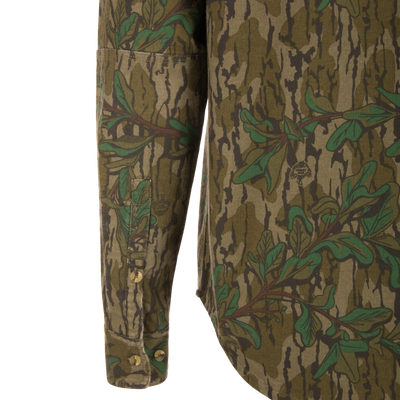 Throwback 80 Button Down Field Shirt, close-up showing durable cotton twill fabric and reinforced forearms, designed for outdoor adventures with triple-needle stitching details.